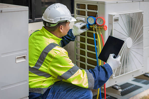 Professional Air Duct Cleaning technician working in Arlington, GA